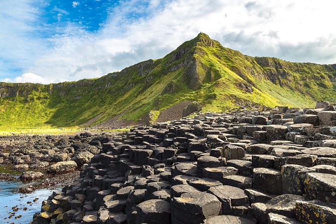 2-Day Northern Ireland Tour from Dublin Including Belfast and Giants Causeway - Day one: Monasterboice and the road to Belfast