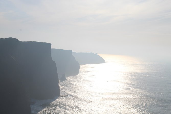 Cliffs of Moher including Cliffs of Moher Boat Experience Luxury Car Tour - Seeing the cliffs from Doolin’s pier