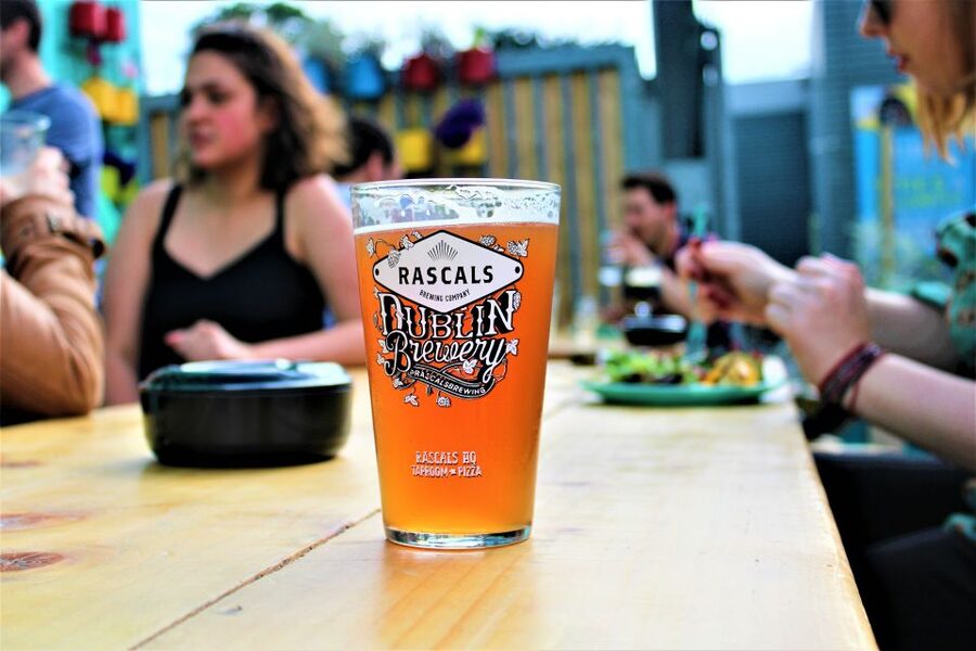 Dublin: Authentic Brewery Tour - Smelling hops beside the brewing vessels