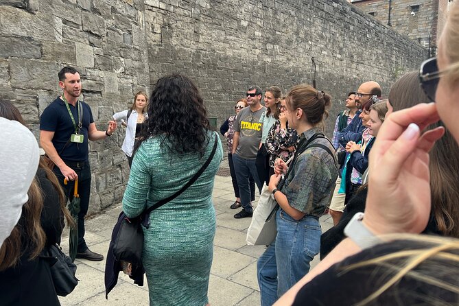 Dublin Highlights and Hidden Gems Guided Walking Tour - Crossing the Liffey by Ha’penny Bridge