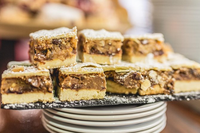 Dublin Historical Centre Food Tour with 8 Food Tastings & Drinks - Cheese, conversation, and a local restaurant setting