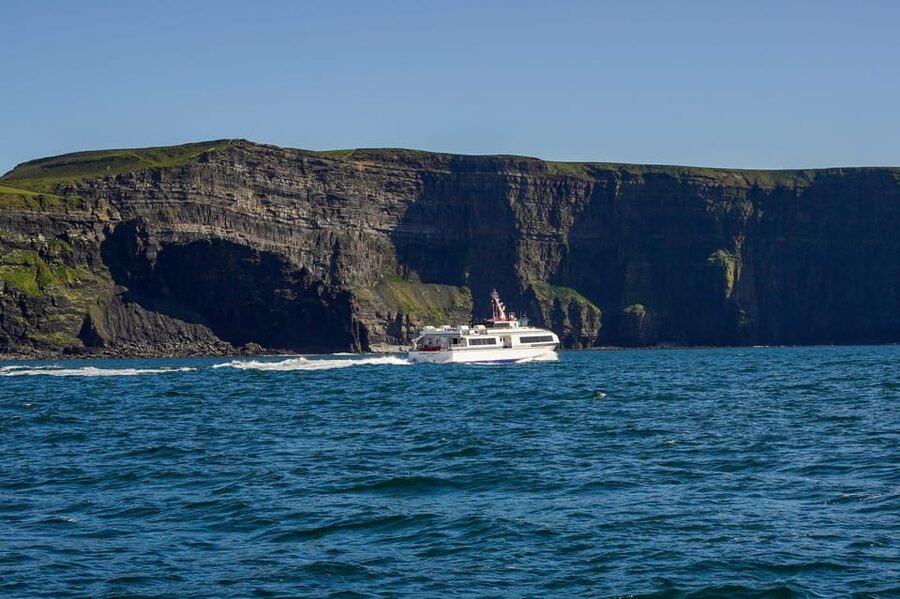 From Dublin: Cliffs of Moher, Boat Tour & Aillwee Cave - Practical packing advice for a wet Atlantic day