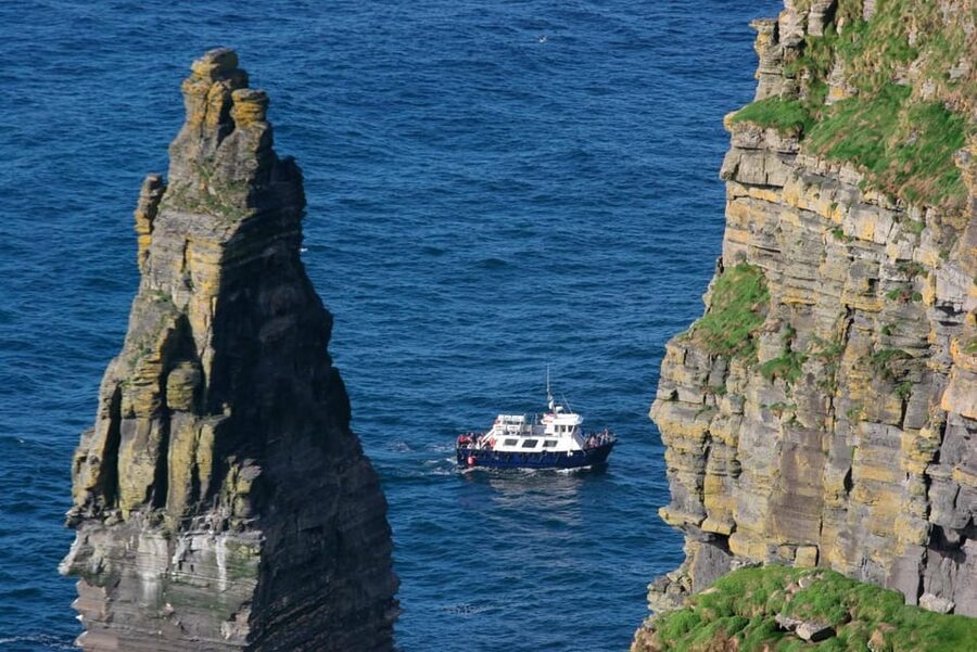 From Dublin: Cliffs of Moher, Boat Tour & Aillwee Cave - The boat beneath the Cliffs of Moher