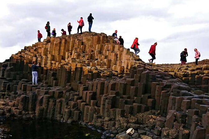 Giants Causeway with Private Chauffeur Day Tour from Dublin - Dunluce Castle above the Atlantic